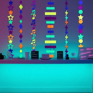 Vertical fluorescent party garlands with neon stars, notes and circles for UV blacklight events