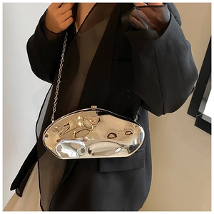 Chic silver acrylic clutch bag featuring an irregular liquid wave design and chain strap