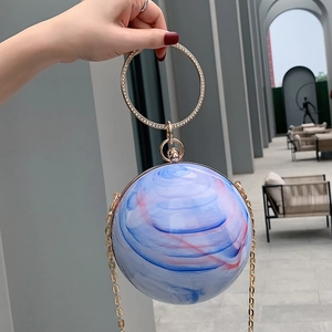 Spherical evening bag with marble pattern, rhinestone metal handle and chain strap