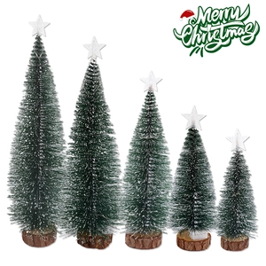 Five assorted mini frosted Christmas trees with glowing stars and wooden bases on white background