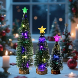 Three mini LED Christmas trees with glowing stars on wooden bases for desk decoration