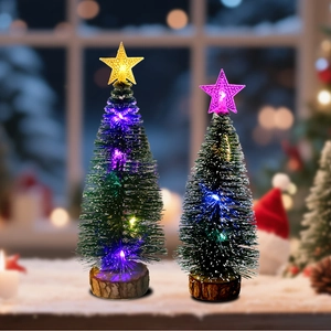 Mini lighted Christmas trees with wooden bases and glowing star toppers for holiday decor