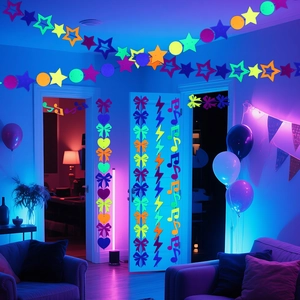 Neon party hanging decorations with stars and hearts glowing under UV blacklight