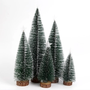 Detail of 5 mini frosted Christmas trees with wooden bases and star toppers