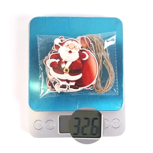 Detailed scale view of a 32.6g 3D printed wooden Christmas Santa hanging ornament