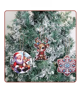 Detail of Santa and reindeer ornaments with jute twine hanging on a Christmas tree