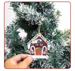 Detail of 3D printed gingerbread house ornament with colorful candy patterns and jute rope