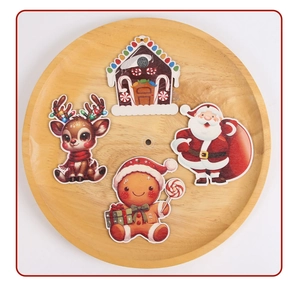 Detailed view of 3D printed wooden Christmas ornaments featuring Santa and reindeer