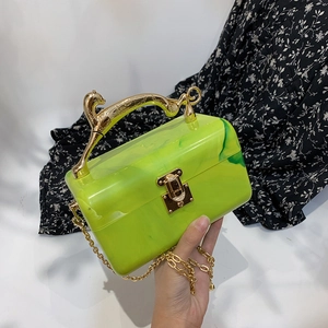 Neon green acrylic marble box clutch bag featuring a unique gold leopard metal handle