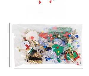 Christmas pet hair clip set with Santa and reindeer motifs in 27x19cm packaging