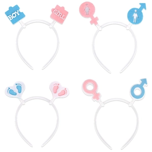 Detail view of gender reveal party headbands with Boy or Girl letters and baby footprints