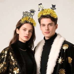Detail shot of Happy New Year headbands with champagne glass and gold glitter decor