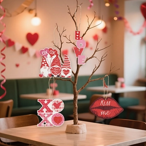Romantic Valentine's Day wooden ornaments with Love and Kiss me text hanging on branches