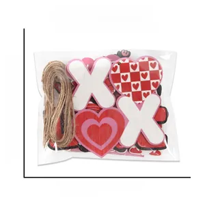 Detailed view of Valentine wood heart ornaments set with natural jute twine and dimensions