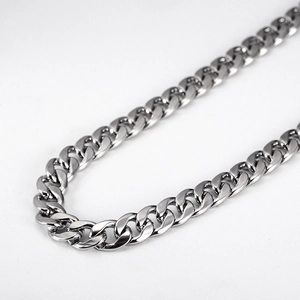 Close-up of a silver polished Cuban link chain with high-quality stainless steel texture