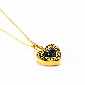 Collier urne coeur en or 18 carats pour cendres avec strass noirs et motif ajouré