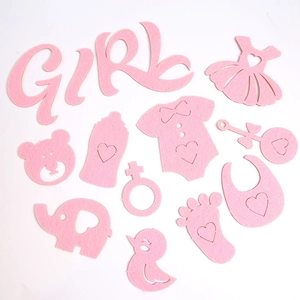 Detailed set of pink felt shapes for gender reveal parties featuring baby girl motifs
