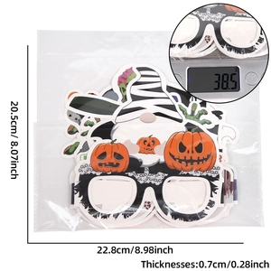 Detailed size chart for Halloween paper glasses showing length, height and weight specifications