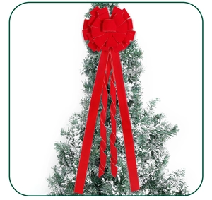 Große rote Samt-Christbaumspitze mit Goldrand-Details auf verschneiten Zweigen
