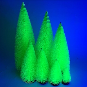 Set of 7 fluorescent green mini Christmas trees in varying heights on round bases