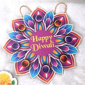 Detailed macro view of a colorful Happy Diwali wooden mandala plaque with hanging ropes
