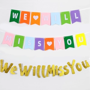 Golden glitter and colorful We Will Miss You retirement party banners for decorations