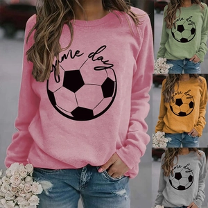 Close-up of Game Day lettering and soccer ball graphic on women's crewneck sweatshirt