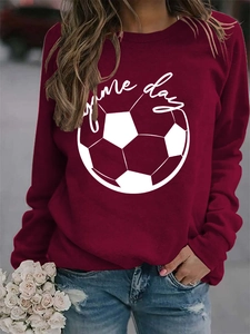 Detail of Game Day graphic print on a maroon long sleeve crewneck sweatshirt for women
