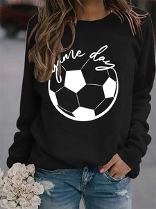 Detail shot of black crewneck sweatshirt with football and game day print on soft fabric