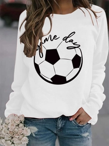 Close-up of white crewneck sweatshirt with Game Day football print and soft cotton texture