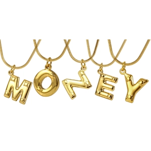 Detail of gold-plated snake chain necklace featuring five 3D beaded initial letter charms