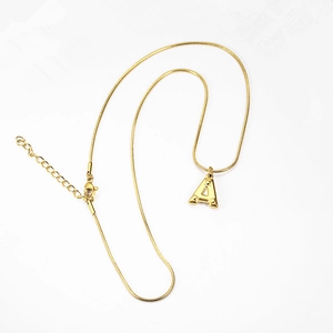 Detail of gold-plated initial A pendant on a snake chain with adjustable lobster clasp