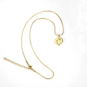 Detailed shot of gold-plated letter Q pendant with snake chain and adjustable clasp