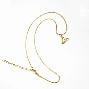 Detail of gold snake chain necklace with hammered texture letter Y pendant and lobster clasp