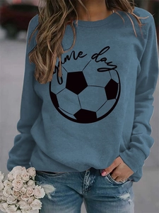 Detail of blue Game Day sweatshirt featuring soccer print and comfortable crew neck design