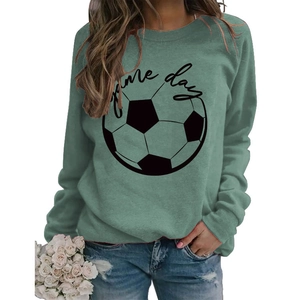Detail of the Game Day graphic print on a green crewneck long sleeve sweatshirt
