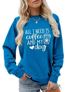 Detail of the ribbed crewneck and 'ALL I NEED' white slogan print on blue sweatshirt