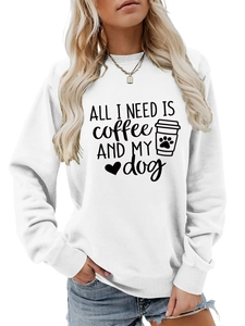 Detail of ALL I NEED IS COFFEE AND MY DOG print on a white long sleeve sweatshirt