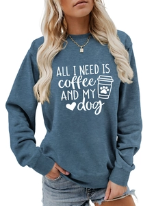 Detail of blue-grey sweatshirt showing the 'ALL I NEED IS coffee AND MY dog' print