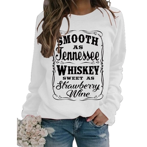 White long-sleeved crewneck sweatshirt with vintage Whiskey lyrics print and blue jeans