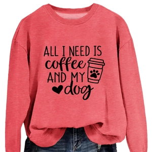 Pink crewneck sweatshirt with 'All I Need Is Coffee and My Dog' print and denim jeans