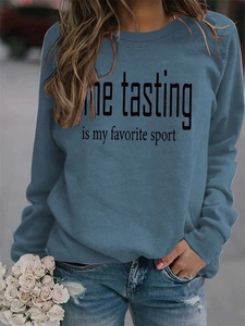 Detail of Wine Tasting is My Favorite Sport print on a dark grey crewneck sweatshirt