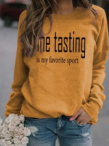 Detail of Mustard Yellow sweatshirt featuring Wine Tasting print and ribbed cuffs
