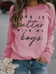 Close-up of pink long-sleeve sweatshirt with Life Is Better With My Boys print