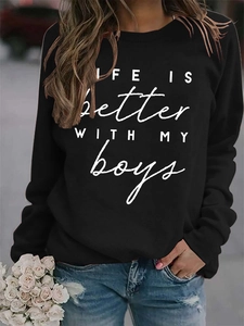 Detail of LIFE IS BETTER WITH MY BOYS slogan printed on black crewneck sweatshirt