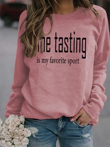 Detail of dusty rose crewneck sweatshirt featuring Wine Tasting print on soft fabric