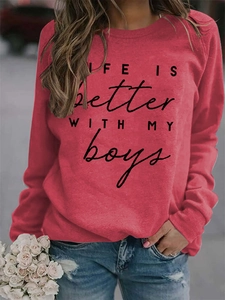 Detail of red crewneck sweatshirt featuring Life Is Better With My Boys black print