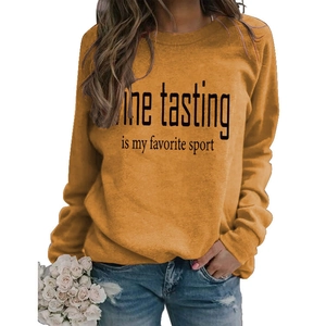Detail of Ginger crewneck sweatshirt featuring Wine Tasting is my favorite sport print