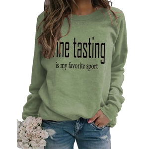 Sage green crewneck sweatshirt with Wine Tasting print paired with ripped jeans