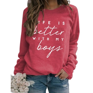 Close-up of LIFE IS BETTER WITH MY BOYS white lettering on a red crewneck sweatshirt
